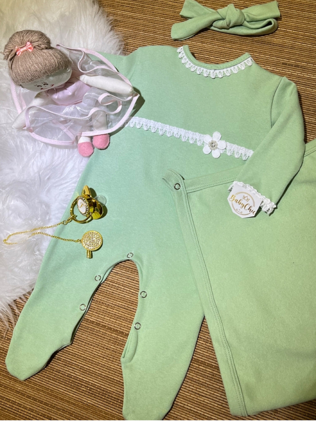 Manta em fio egípcio com prendedor de chupeta